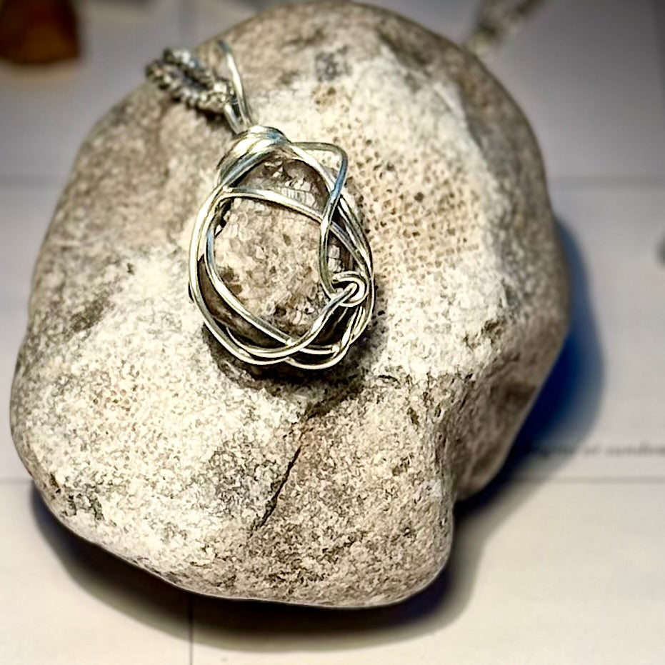 Embeded Fossilized Honeycomb Wire Wrapped Pendant