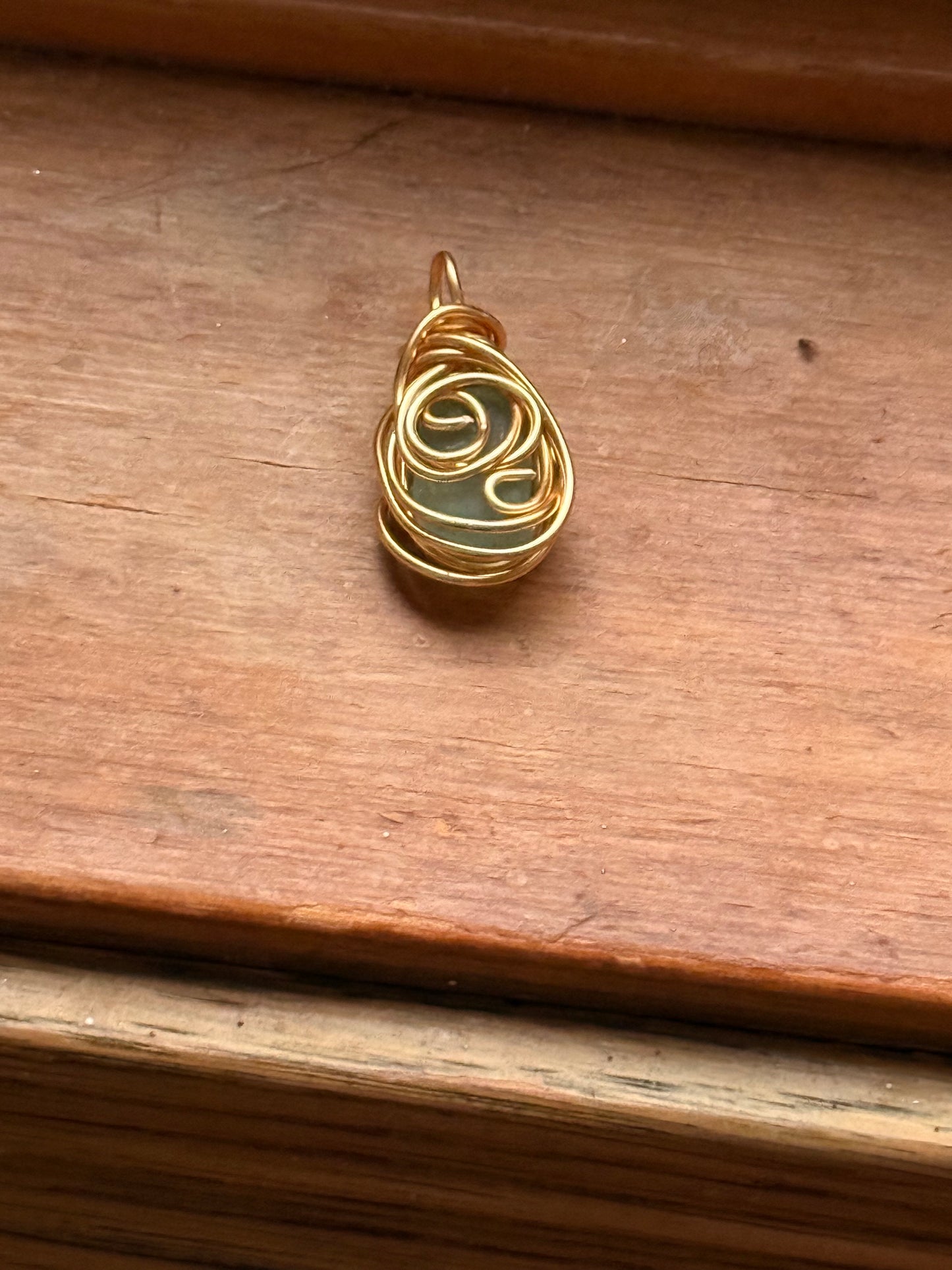 Rounded aqua Lake Erie glass pendant