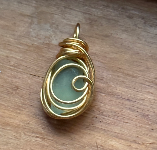 Rounded aqua Lake Erie glass pendant
